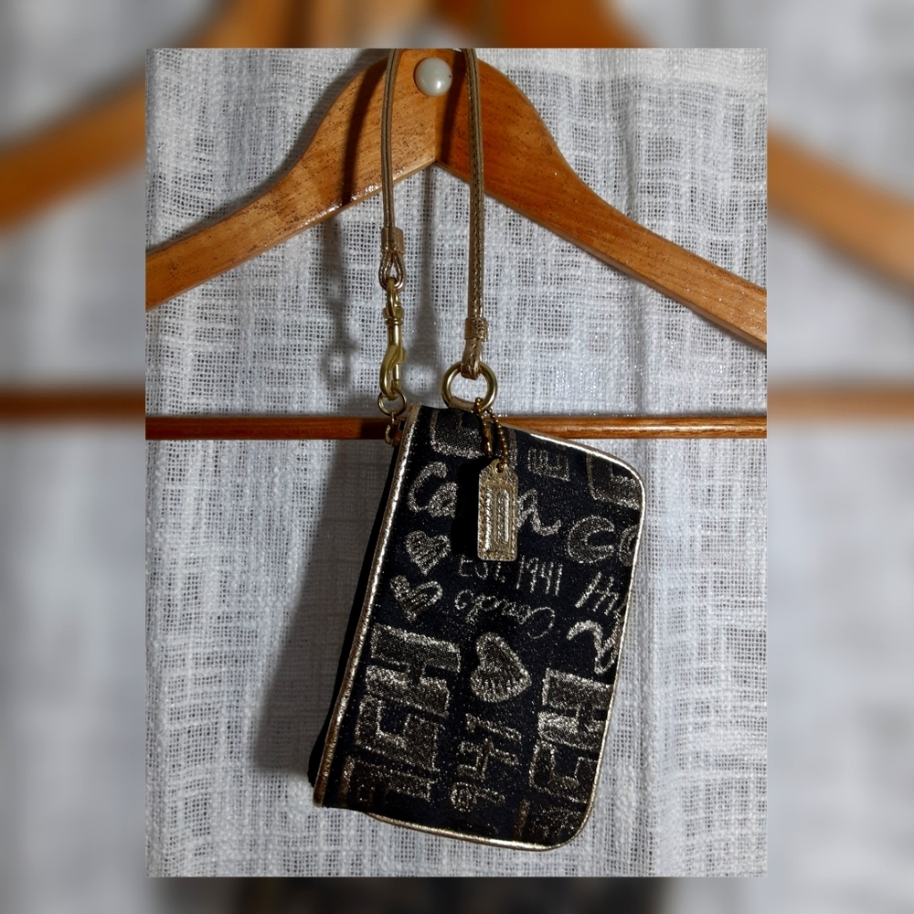 Coach Poppy Wristlet Black and Gold